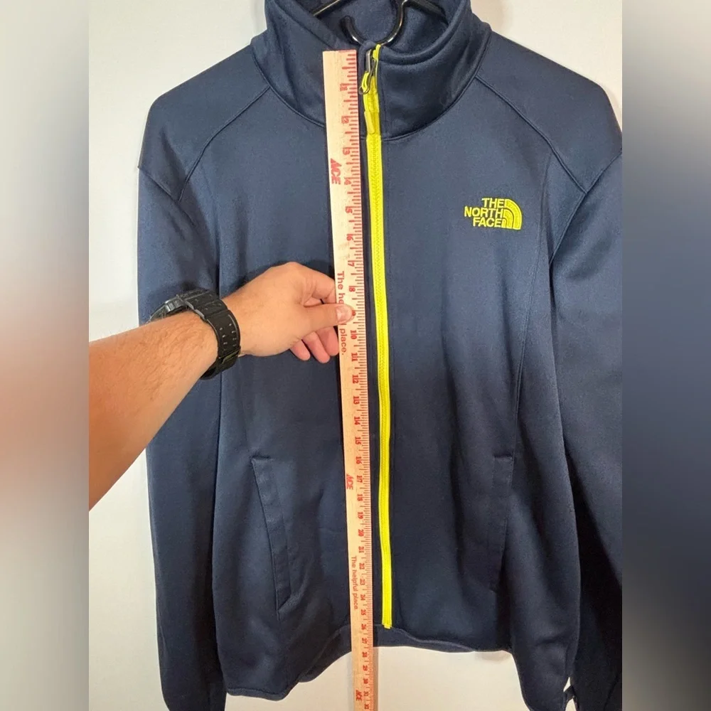 The North Face Men's Navy Jacket with Yellow Zipper